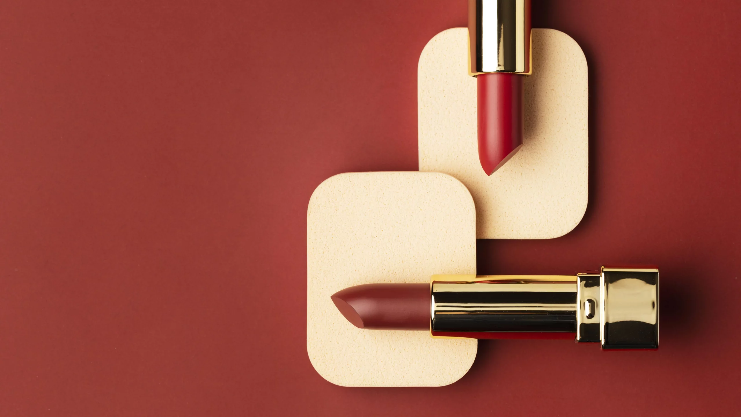 red lipsticks background scaled